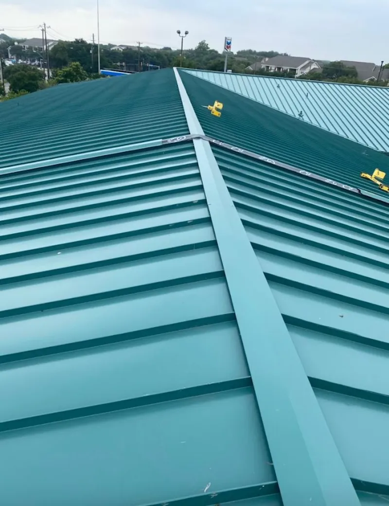 Green commercial metal roof ridge and valley for Metal Roof Repair in Temescal Valley